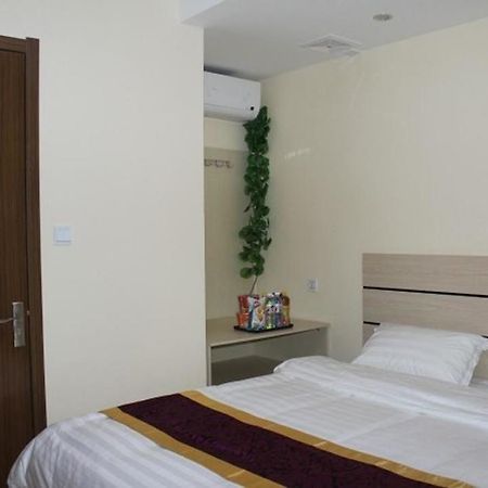 Dalian Kai Bin Business Inn Bagian luar foto