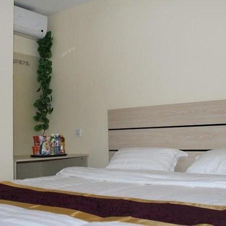 Dalian Kai Bin Business Inn Bagian luar foto