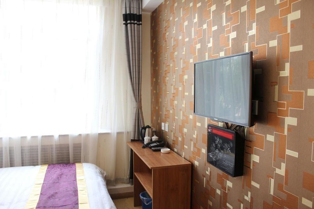 Dalian Kai Bin Business Inn Bagian luar foto