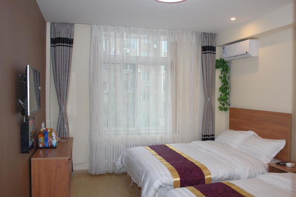 Dalian Kai Bin Business Inn Bagian luar foto