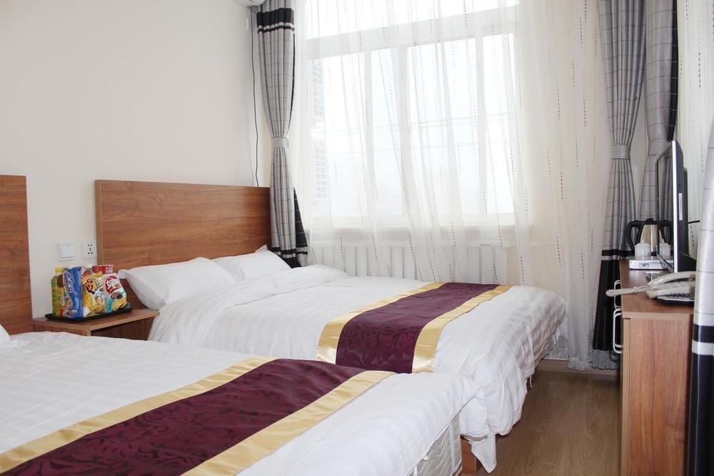 Dalian Kai Bin Business Inn Bagian luar foto