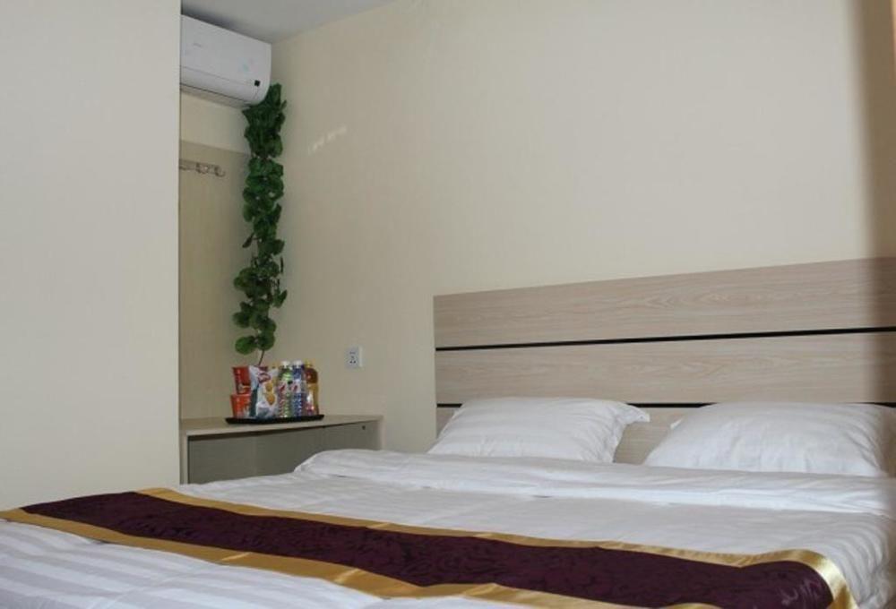 Dalian Kai Bin Business Inn Bagian luar foto