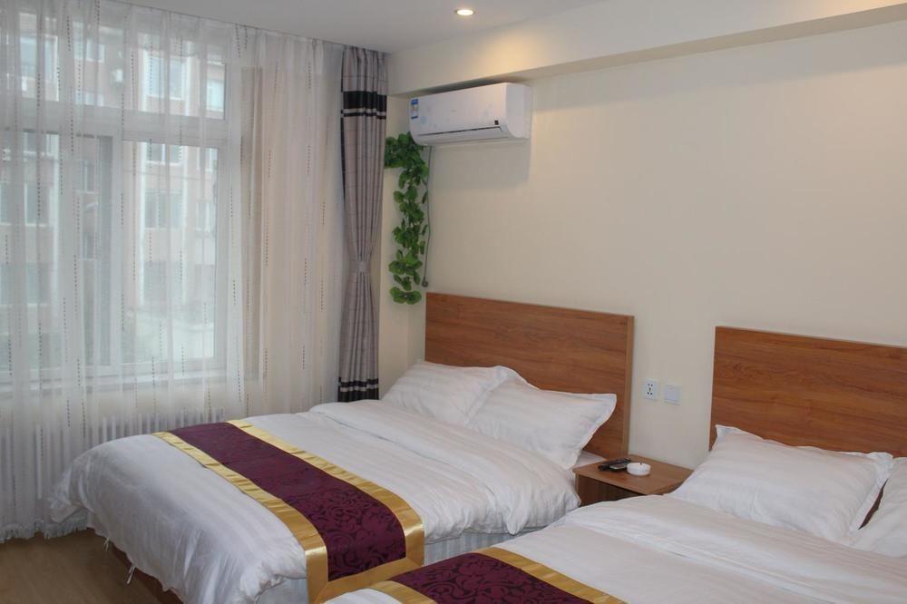 Dalian Kai Bin Business Inn Bagian luar foto